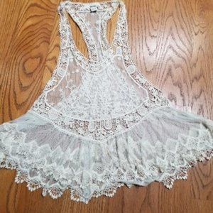 white crocheted vest